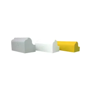 The three cervical Denneroll sizes side by side: the large in grey, the medium in white and the small in gold, each a foam block with a ridged top