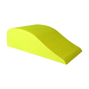 A gold foam Thoracic Retrainer: a low ramp with a smooth, flat-topped curve and no peak