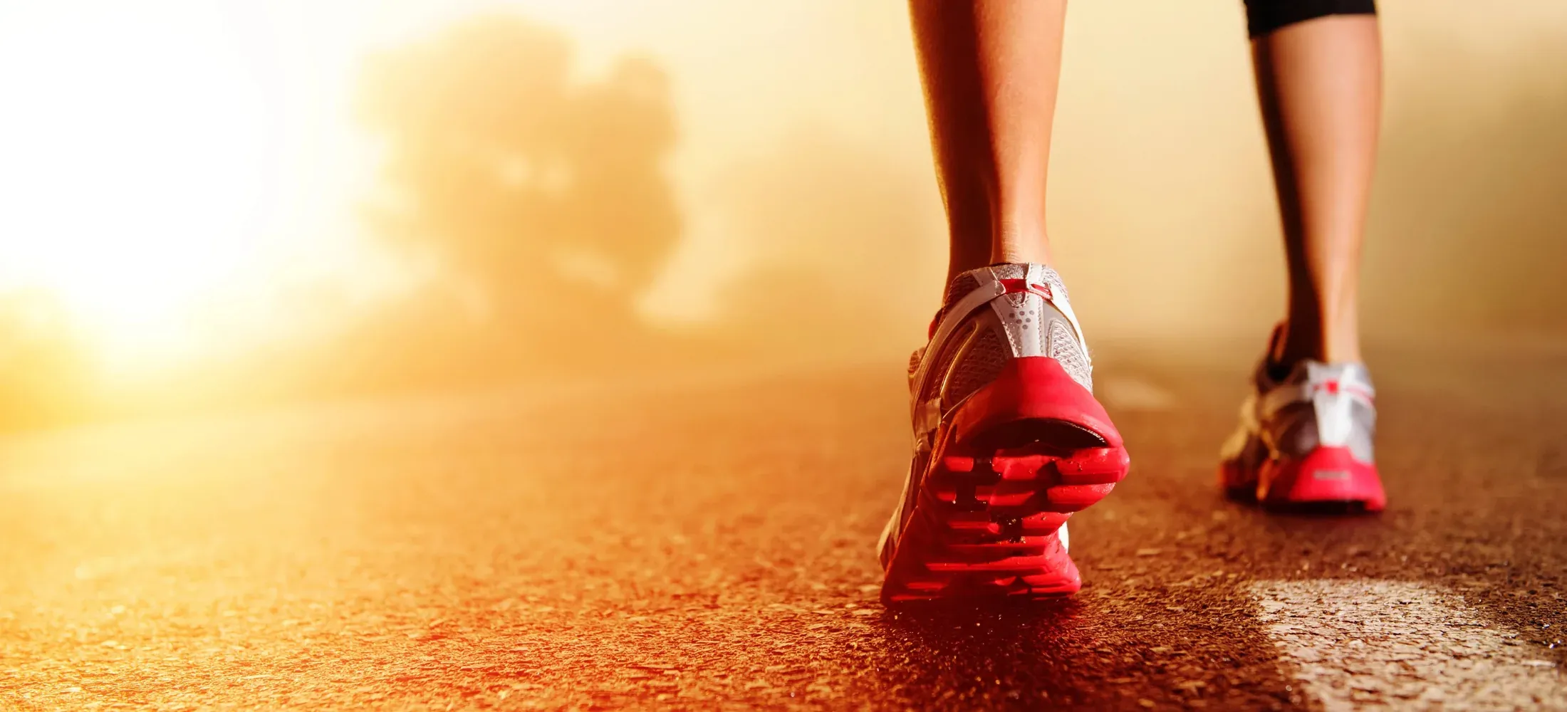 A runner on a path, mid-stride