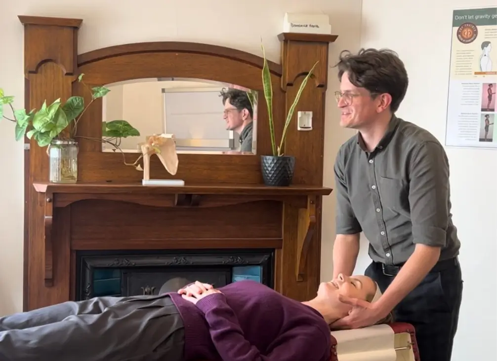 Chiropractor Melbourne performing neck adjustment to relieve headaches