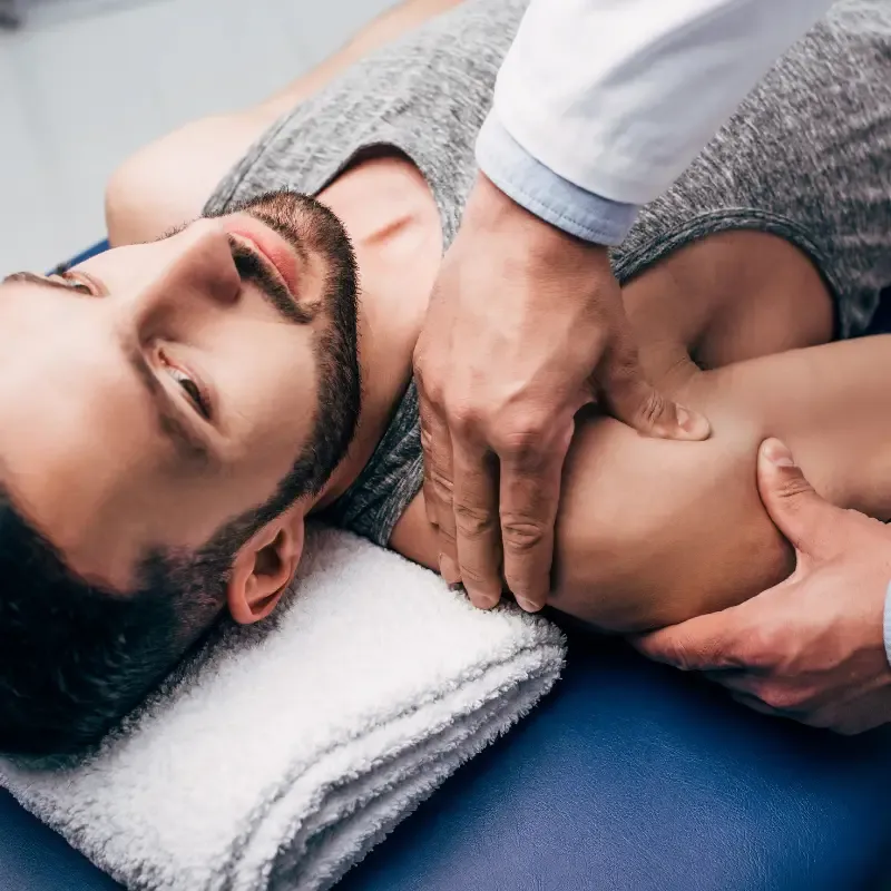 Chiropractic sports massage for a Windy Hill Essendon footy player recovering at Chiropractor Melbourne