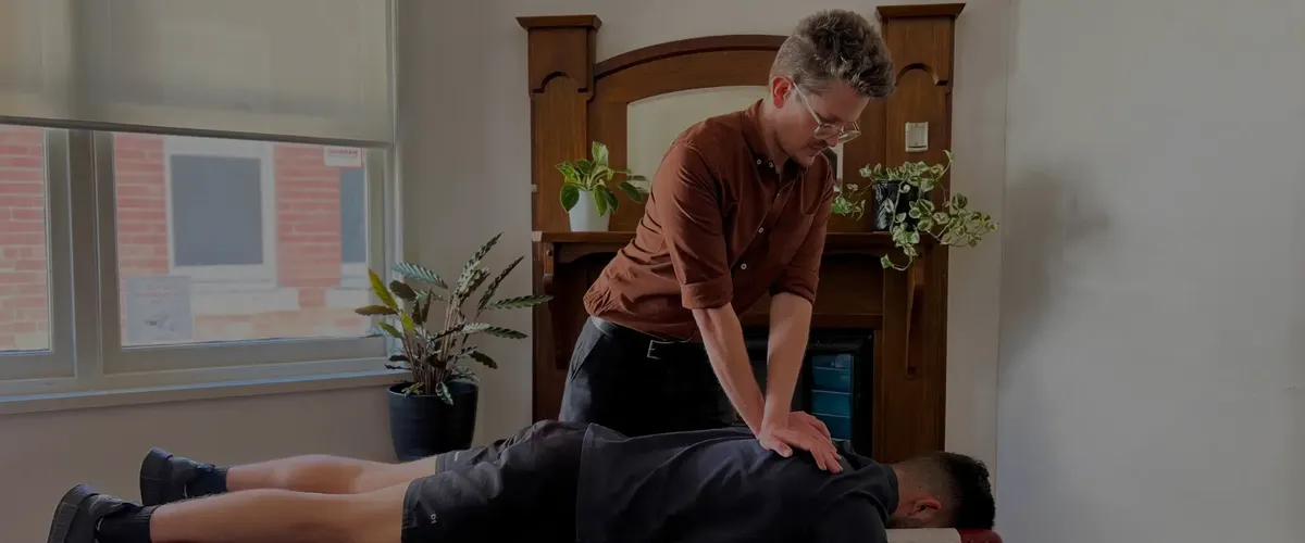 Chiropractor providing ongoing care for a Niddrie patient at the Brunswick West clinic